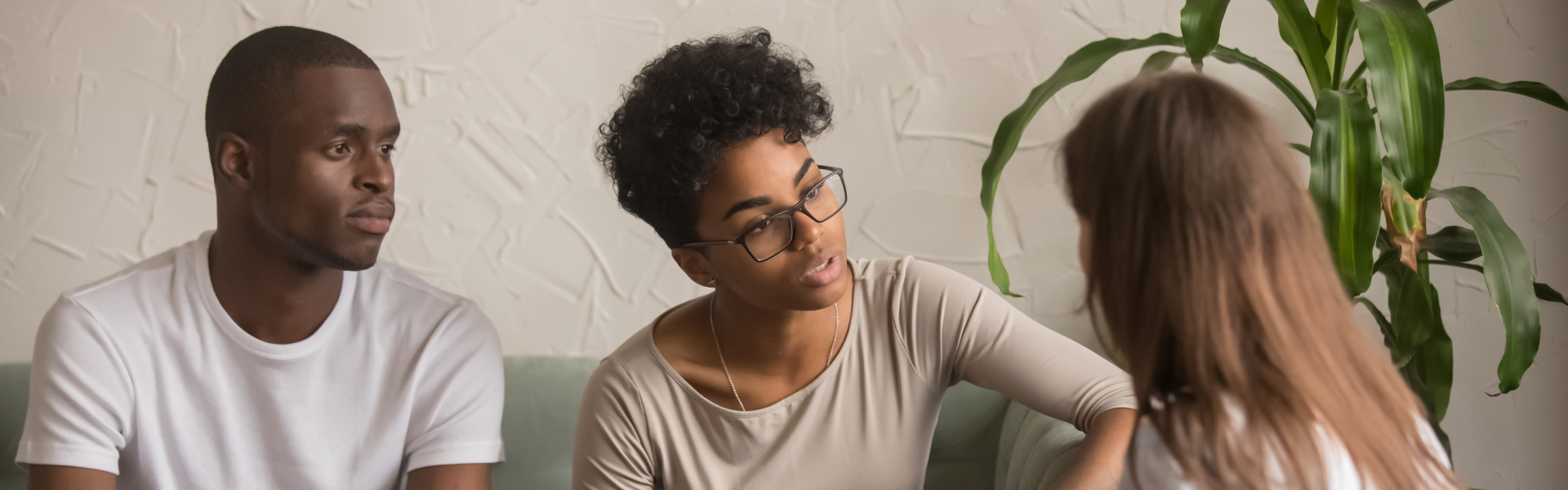 a couple talking to a therapist