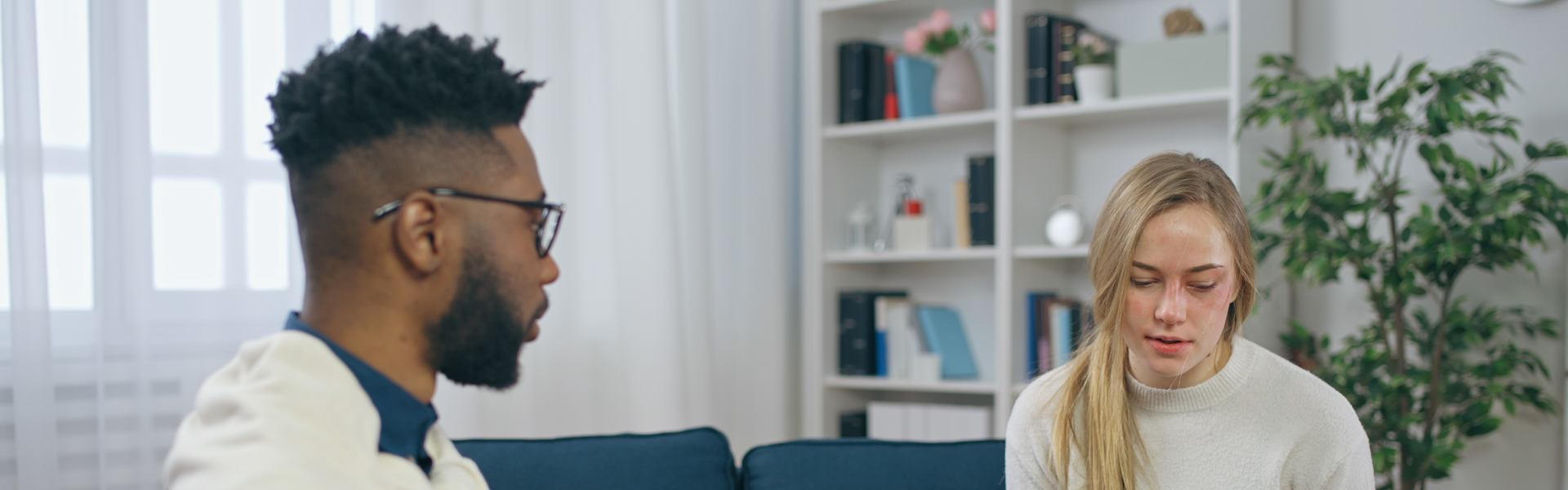 a woman talking to a pyschologist